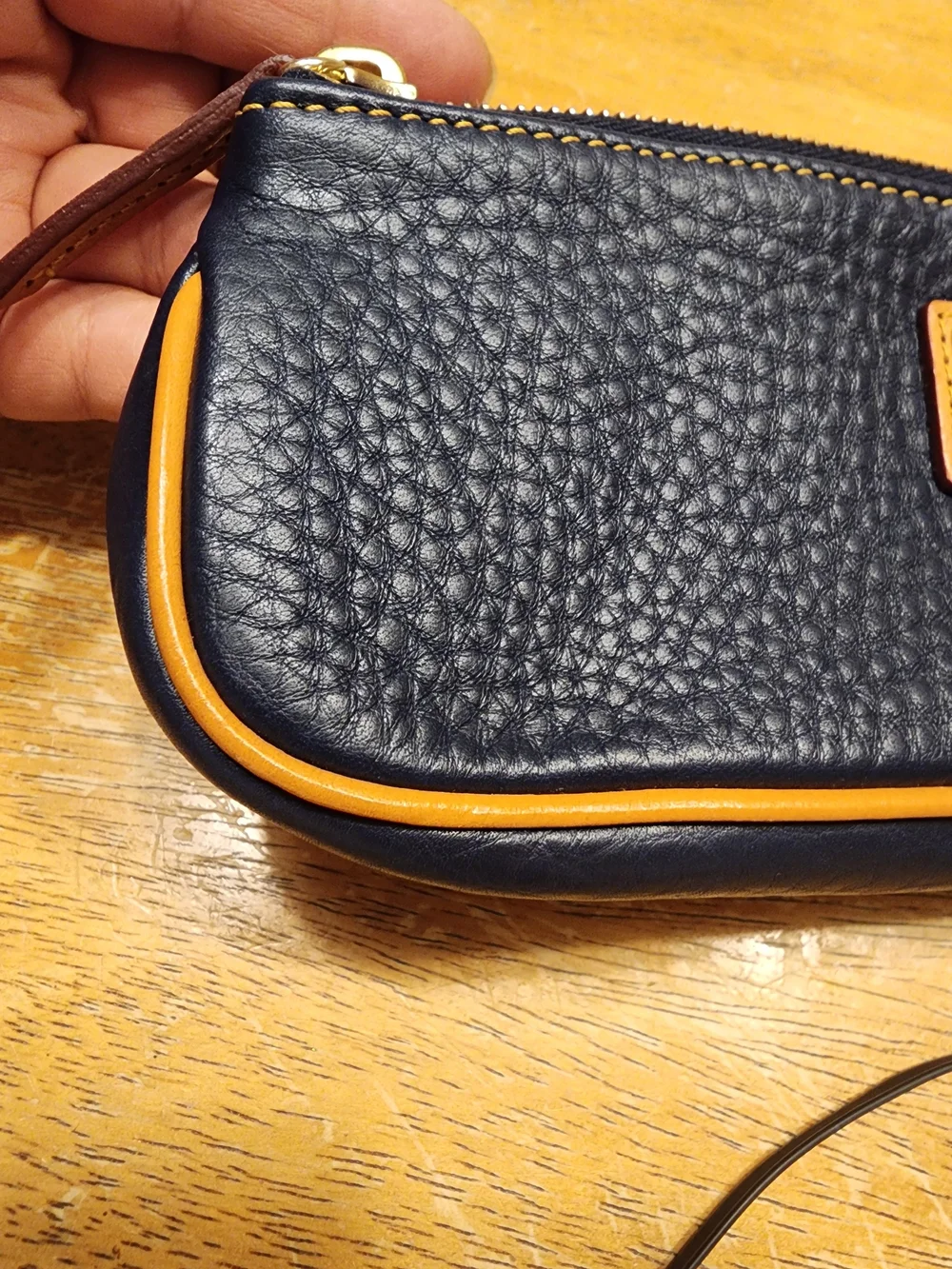 Dooney & Bourke Pebble Grain Slim Cosmetic slim pouch in navy blue Leather